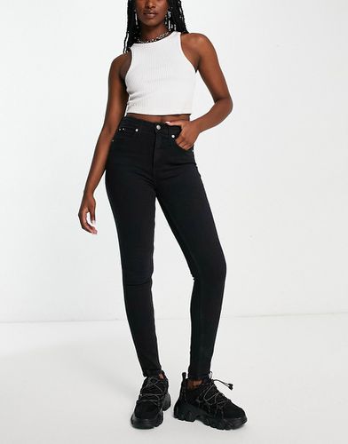 Jeans super skinny a vita alta neri-Nero - Calvin Klein Jeans - Modalova