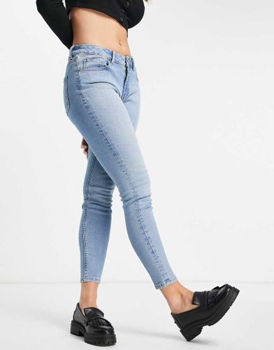 Jeans skinny a vita bassa azzurri-Blu - ASOS DESIGN - Modalova
