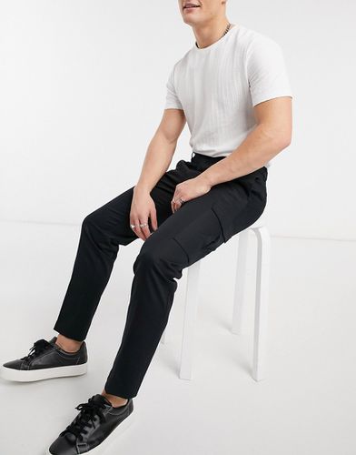 Pantaloni eleganti neri con tasche cargo - Burton Menswear - Modalova