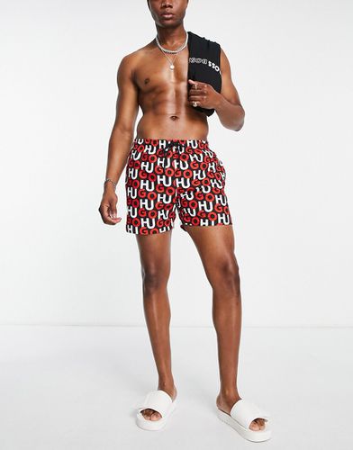 HUGO - Swimwear Kook - Pantaloncini da bagno rossi con motivo stampato del logo-Nero - HUGO Bodywear - Modalova