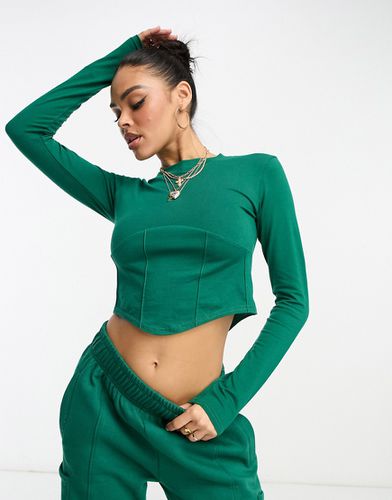 Crop top a maniche lunghe con corsetto verde in coordinato - Il Sarto - Modalova